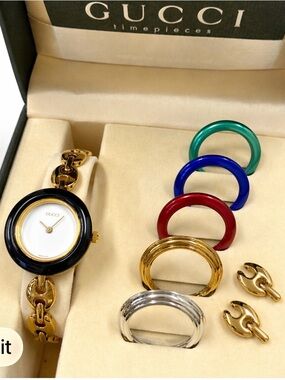 Gucci Gold Bracelet Watch with Interchangeable Bezels in Black, Red, Blue, Green